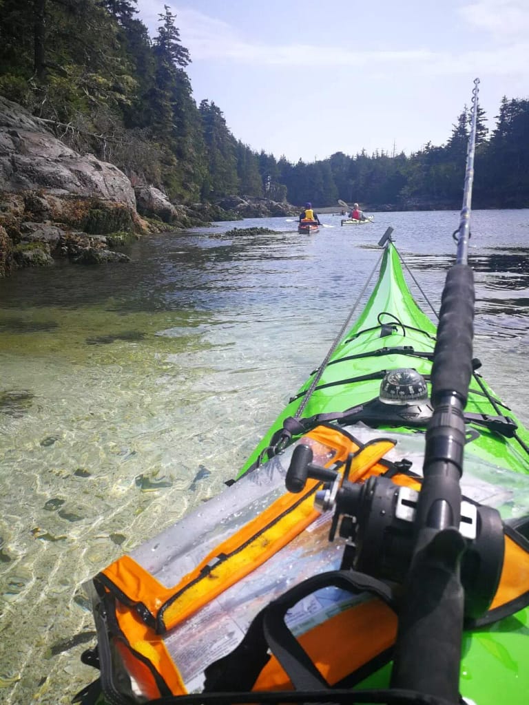 fishing from the kayak on the see kayaking adventure - Broken Group Islands BC